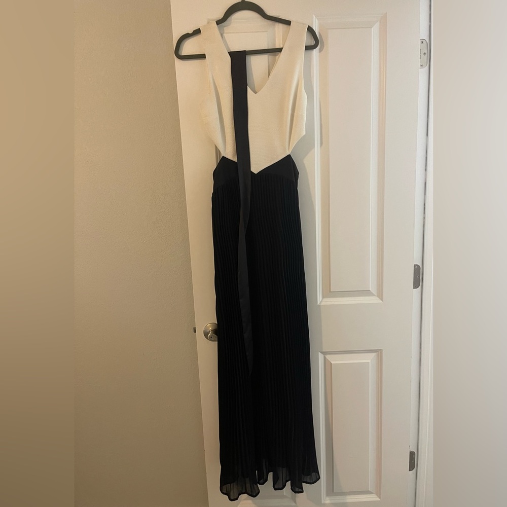 Pleated skirt maxi dress with side cutouts by Double Zero